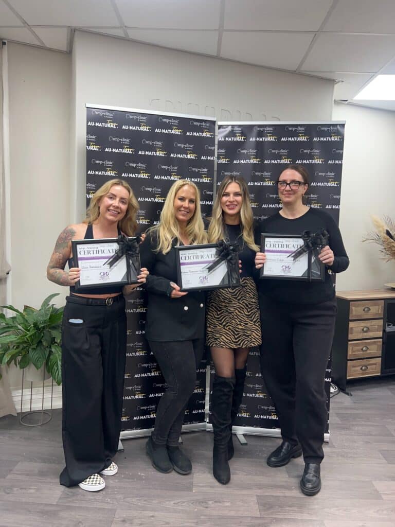 International students learning scalp micropigmentation during hands-on SMP training in the UK at SMP-Clinic & Training Academy